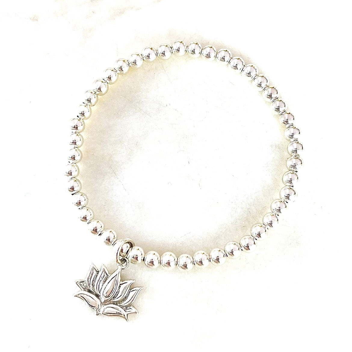 Silver lotus hotsell bracelet